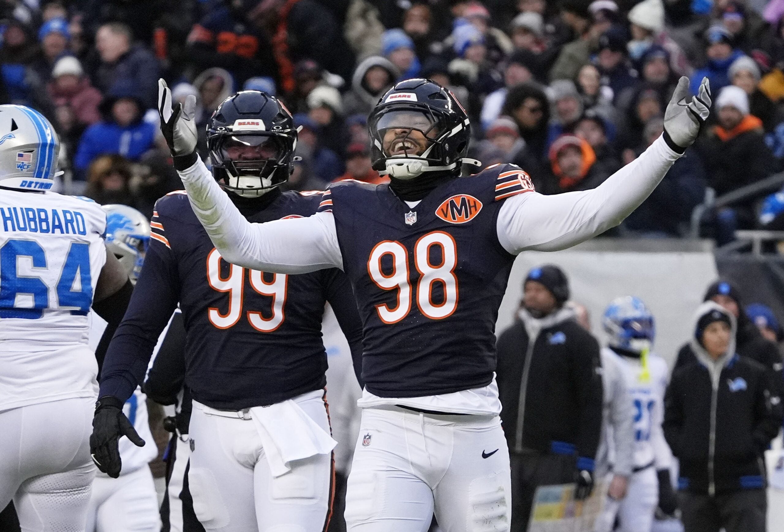 Jan 4, 2026; Chicago, Illinois, USA; Chicago Bears defensive end Montez Sweat (98) celebrates after a sack against the Detroit Lions during the first half at Soldier Field.