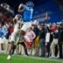 Ole Miss wide receiver De'Zhaun Stribling (1) catches the ball before being tackled by Miami Hurricanes defensive back Ja'boree Antoine (16) and dropping it during the CFP Fiesta Bowl at the State Farm Stadium, in Glendale, Ariz., on Thursday, Jan. 8, 2026.