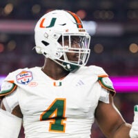 Jan 8, 2026; Glendale, AZ, USA; Miami Hurricanes defensive lineman Rueben Bain Jr. (4) against the Mississippi Rebels during the 2026 Fiesta Bowl and semifinal game of the College Football Playoff at State Farm Stadium.
