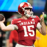 Jan 9, 2026; Atlanta, GA, USA; Indiana Hoosiers quarterback Fernando Mendoza (15) throws a pass against the Oregon Ducks during the third quarter of the 2025 Peach Bowl and semifinal game of the College Football Playoff at Mercedes-Benz Stadium