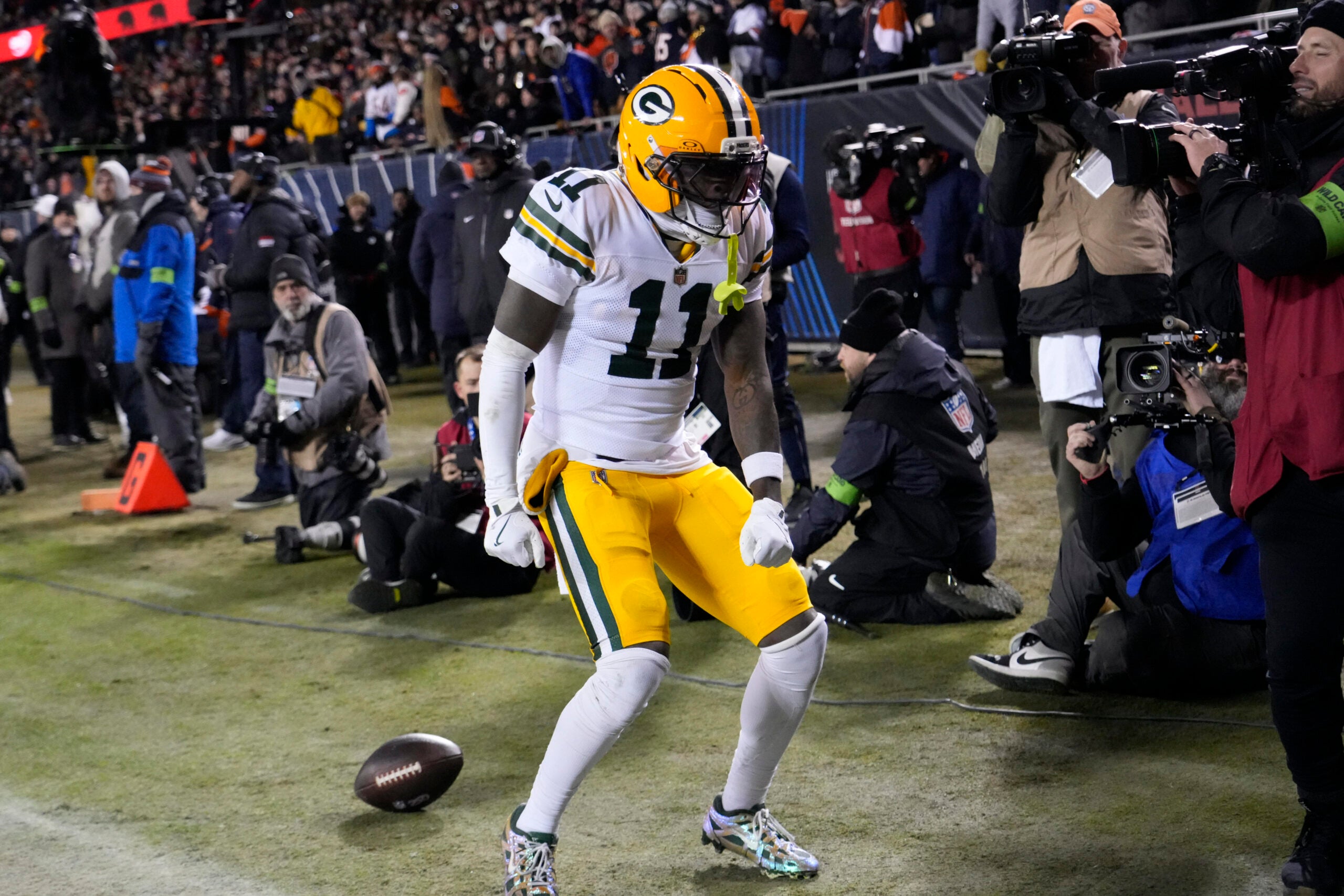 Jan 10, 2026; Chicago, IL, USA; Green Bay Packers wide receiver Jayden Reed (11) reacts after scoring touchdown against the Chicago Bears during the first half of an NFC Wild Card Round game at Soldier Field.