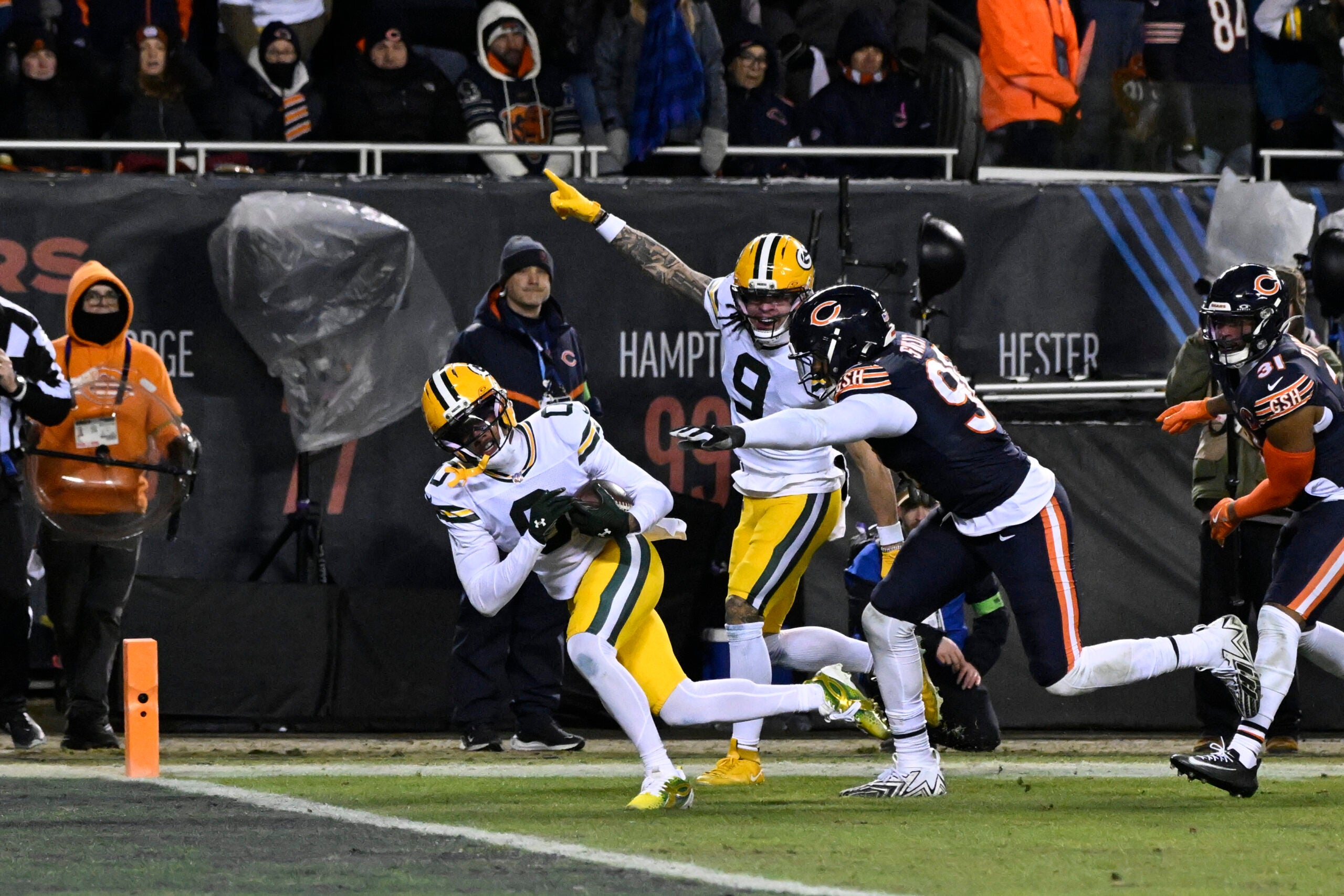 Jan 10, 2026; Chicago, IL, USA; Green Bay Packers wide receiver Matthew Golden (0) runs after the catch to score a touchdown against the Chicago Bears during the second half of an NFC Wild Card Round game at Soldier Field.