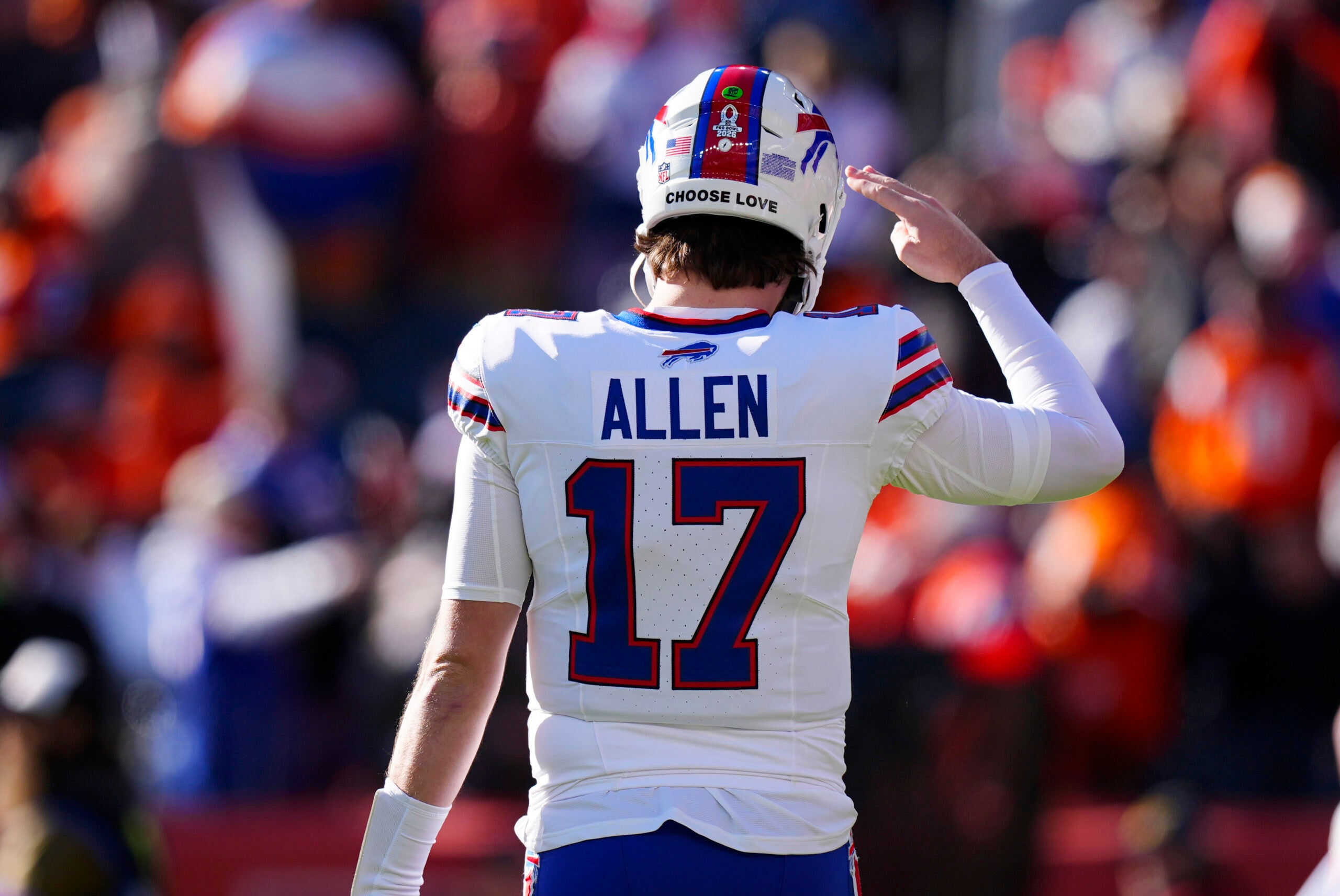 Jan 17, 2026; Denver, CO, USA; Buffalo Bills quarterback Josh Allen (17) salutes before an AFC Divisional Round playoff game against the Denver Broncos at Empower Field at Mile High.