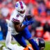 Jan 17, 2026; Denver, CO, USA; Buffalo Bills wide receiver Keon Coleman (0) scores a touchdown during the third quarter of an AFC Divisional Round playoff game against the Denver Broncos at Empower Field at Mile High.