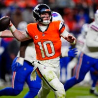 Jan 17, 2026; Denver, CO, USA; Denver Broncos quarterback Bo Nix (10) throws during the fourth quarter of an AFC Divisional Round playoff game against the Buffalo Bills at Empower Field at Mile High.