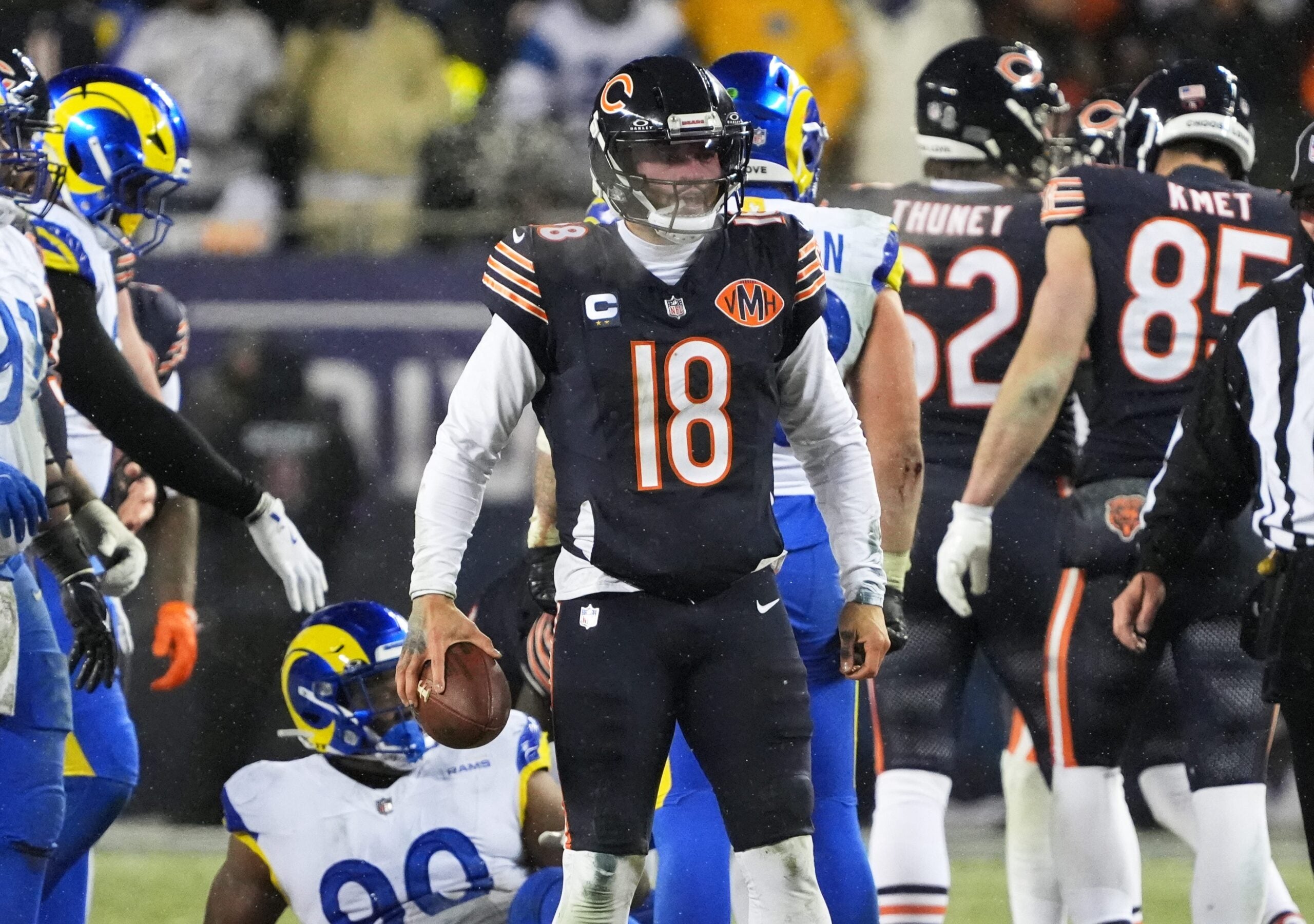 Jan 18, 2026; Chicago, IL, USA; Chicago Bears quarterback Caleb Williams (18) looks on against the Los Angeles Rams during overtime of an NFC Divisional Round game at Soldier Field.