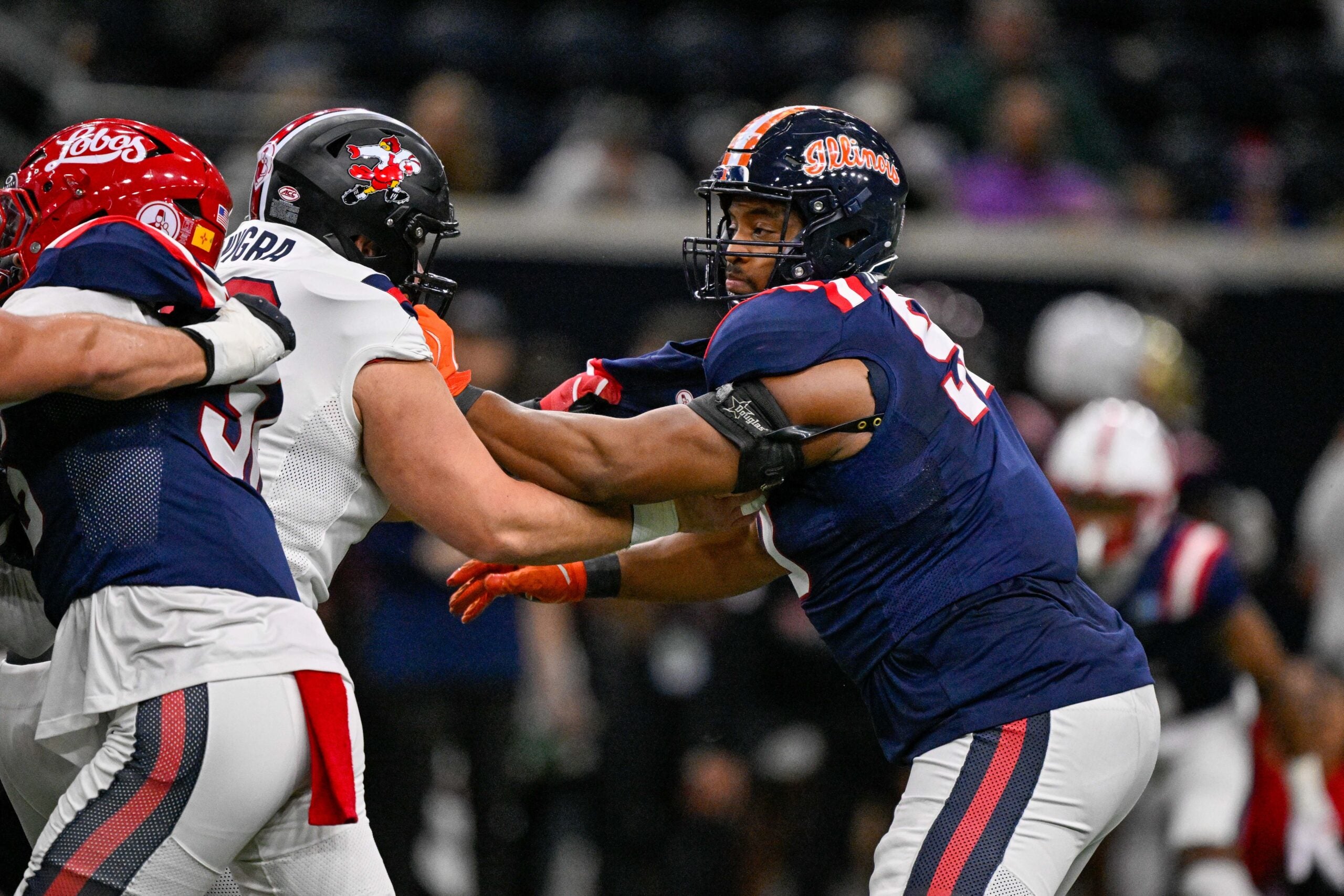 Jan 27, 2026; Frisco, TX, USA; East offensive lineman Pete Nygra (50) blocks West defensive lineman James Thompson Jr. (90) during the first half at the Ford Center at the Star.