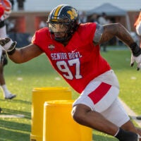 Jan 29, 2026; Mobile, AL, USA; American defensive tackle Chris Mcclellan (97) of Missouri of Boston College works in a drill during American Senior Bowl practice at Hancock Whitney Stadium.