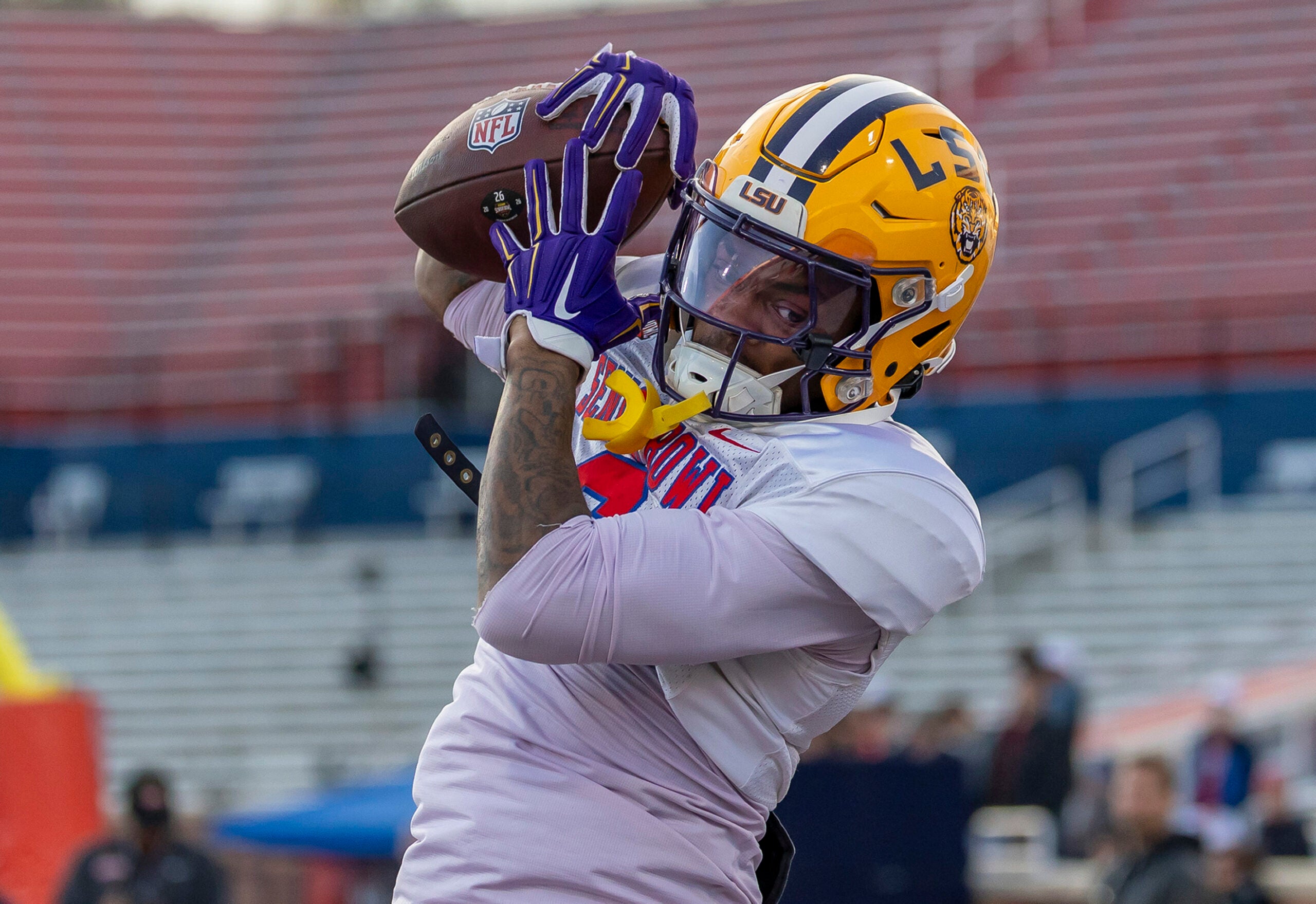 Jan 29, 2026; Mobile, AL, USA; American wide receiver Barion Brown (6) of LSU grabs a touchdown pass during American Senior Bowl practice at Hancock Whitney Stadium.