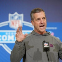 Feb 24, 2026; Indianapolis, IN, USA; New York Giants coach John Harbaugh speaks at the NFL Scouting Combine at the Indiana Convention Center.
