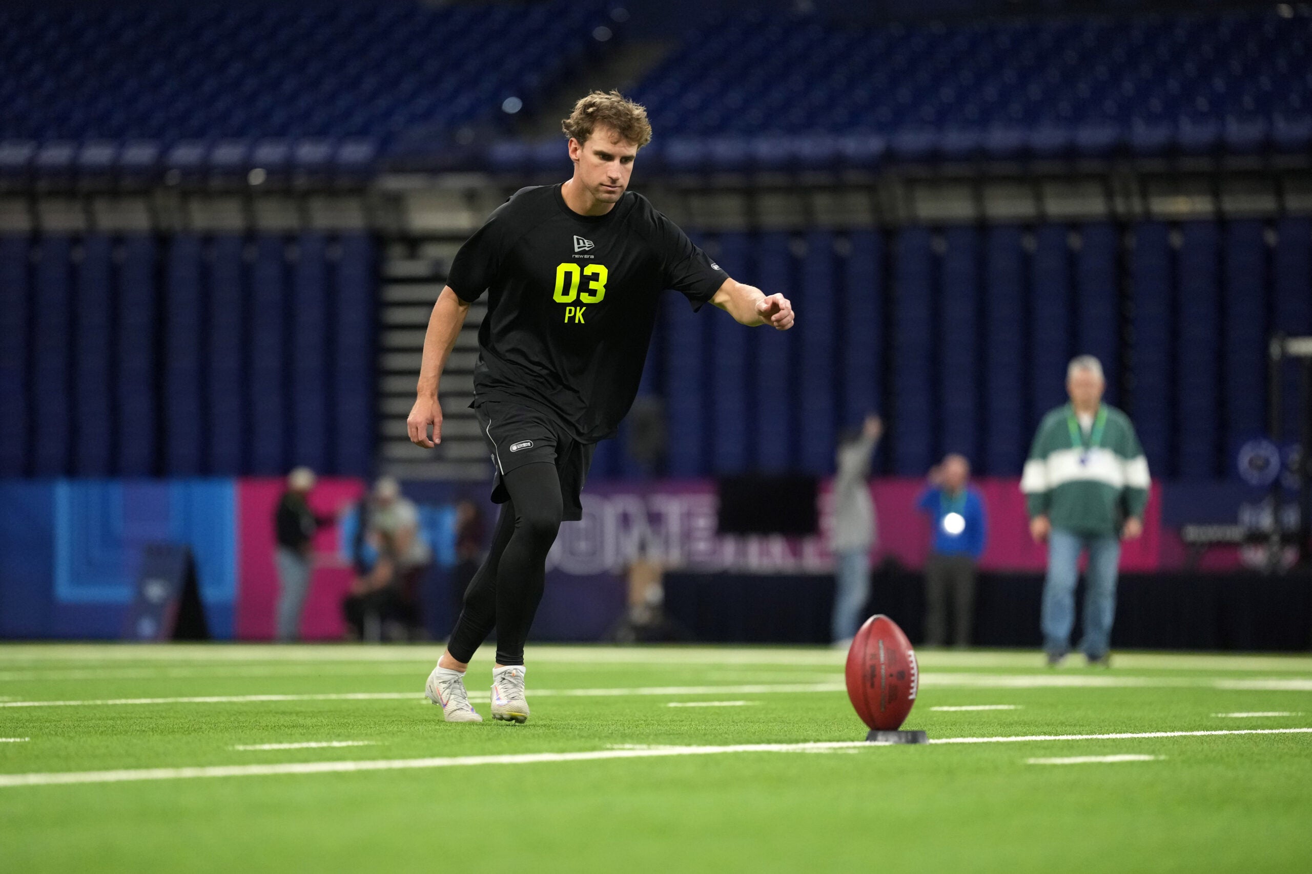 Feb 25, 2026; Indianapolis, IN, USA; Florida place kicker Trey Smack (PK03) kicks the ball during the NFL Scouting Combine at Lucas Oil Stadium.