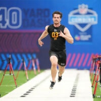 Feb 28, 2026; Indianapolis, IN, USA; Illinois quarterback Luke Altmyer (QB03) during the NFL Scouting Combine at Lucas Oil Stadium.