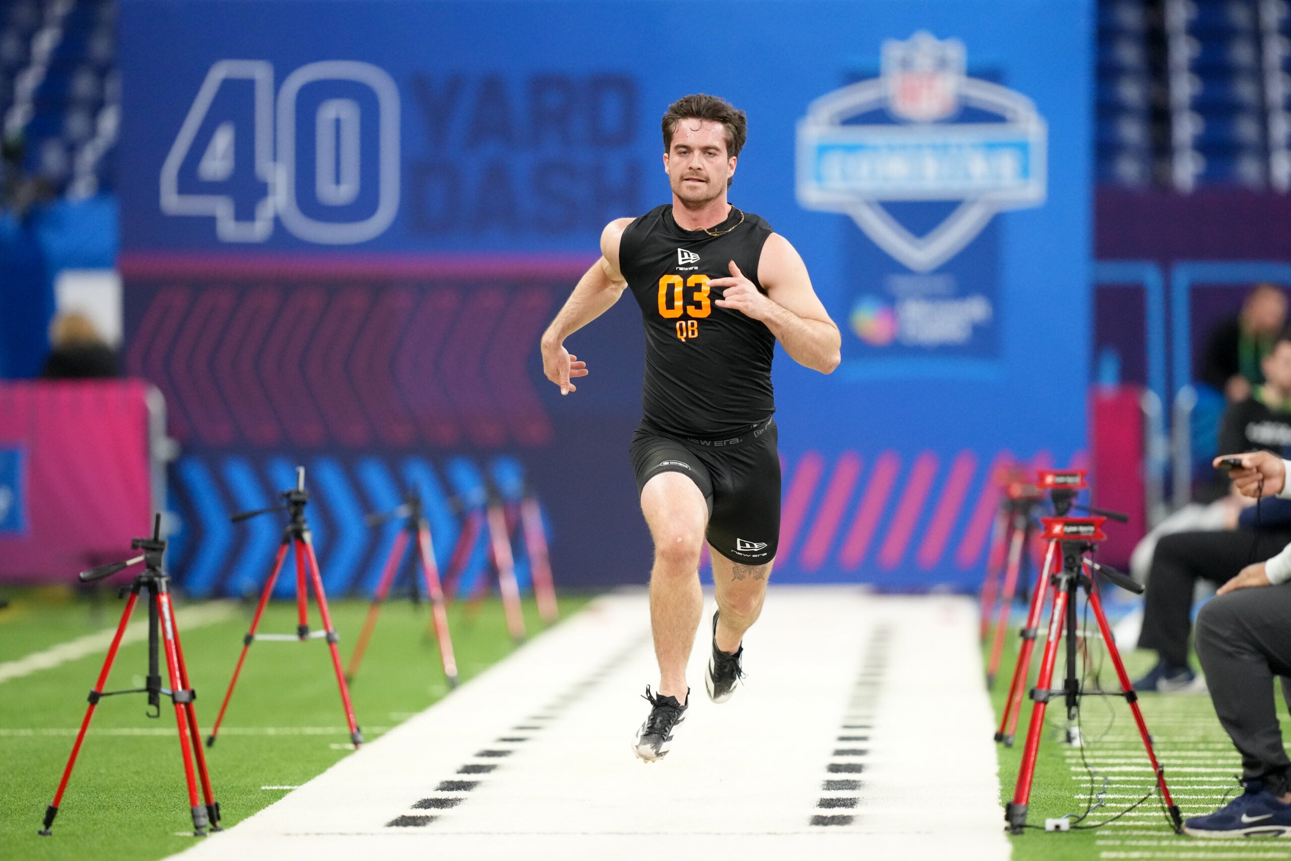 Feb 28, 2026; Indianapolis, IN, USA; Illinois quarterback Luke Altmyer (QB03) during the NFL Scouting Combine at Lucas Oil Stadium.