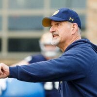 Offensive line coach Joe Rudolph runs a drill during a Notre Dame football practice at Irish Athletic Center on Friday, March 20, 2026, in South Bend.