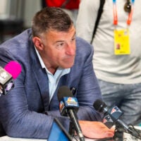 Mar 31, 2026; Phoenix, AZ, USA; New England Patriots head coach Mike Vrabel speaks to reporters in the media during the 2026 NFL Annual League Meeting at the Arizona Biltmore.