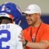 Florida head coach Jon Sumrall talks with Florida cornerback Ben Hanks II (12) during practice during spring practice at Sanders Practice Fields in Gainesville, FL on Thursday, April 2, 2026.