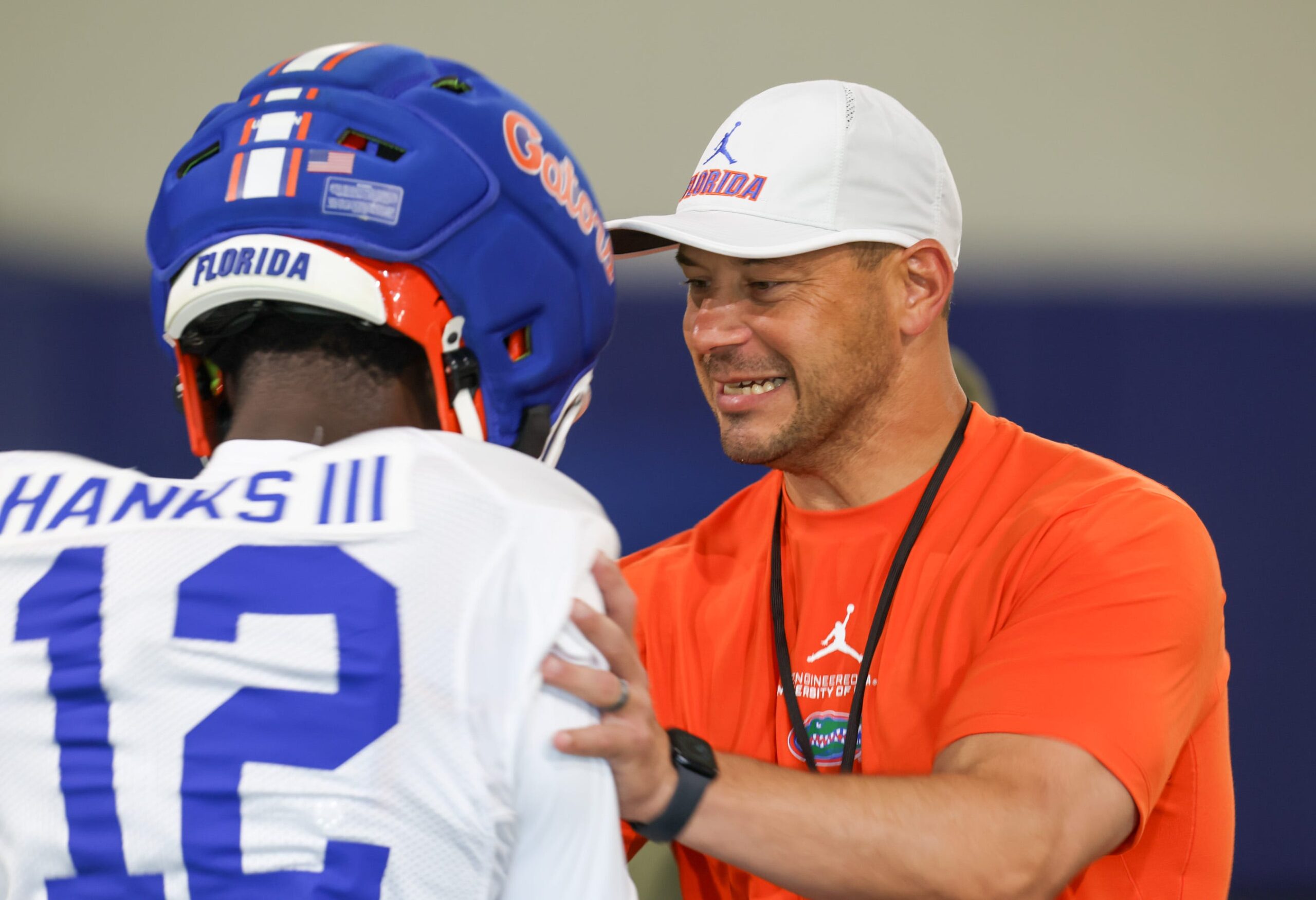 Florida head coach Jon Sumrall talks with Florida cornerback Ben Hanks II (12) during practice during spring practice at Sanders Practice Fields in Gainesville, FL on Thursday, April 2, 2026.