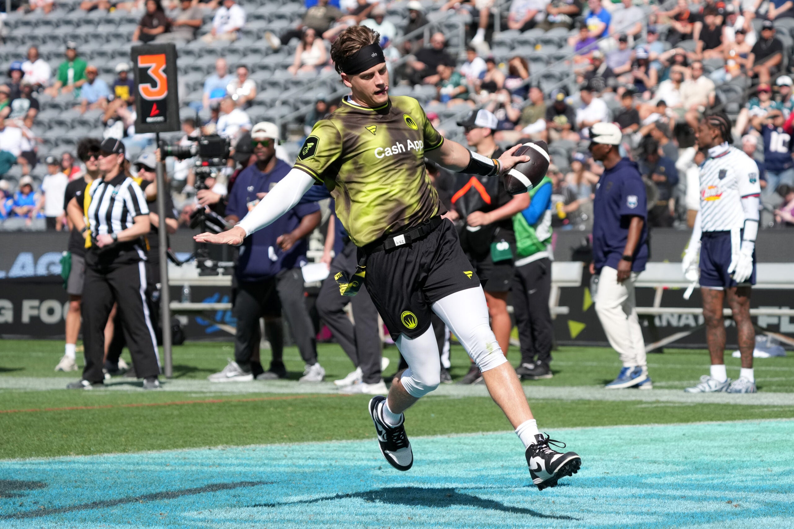 Mar 21, 2026; Los Angeles, CA, USA; Wildcats FFC quarterback Joe Burrow carries the ball during the Fanatics Flag Football Classic at BMO stadium.