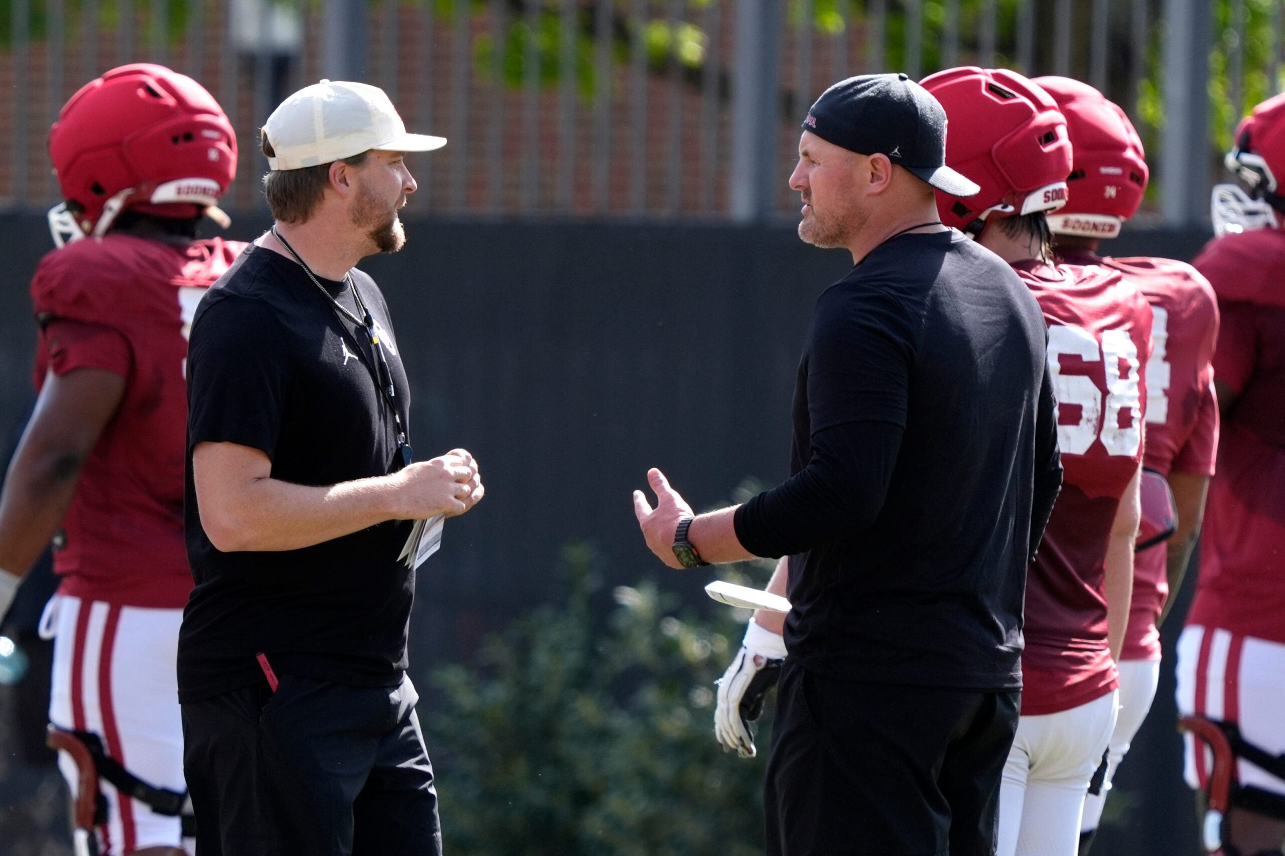 Oklahoma Sooners offensive coordinator Ben Arbuckle freshman quarterback Bowe Bentley