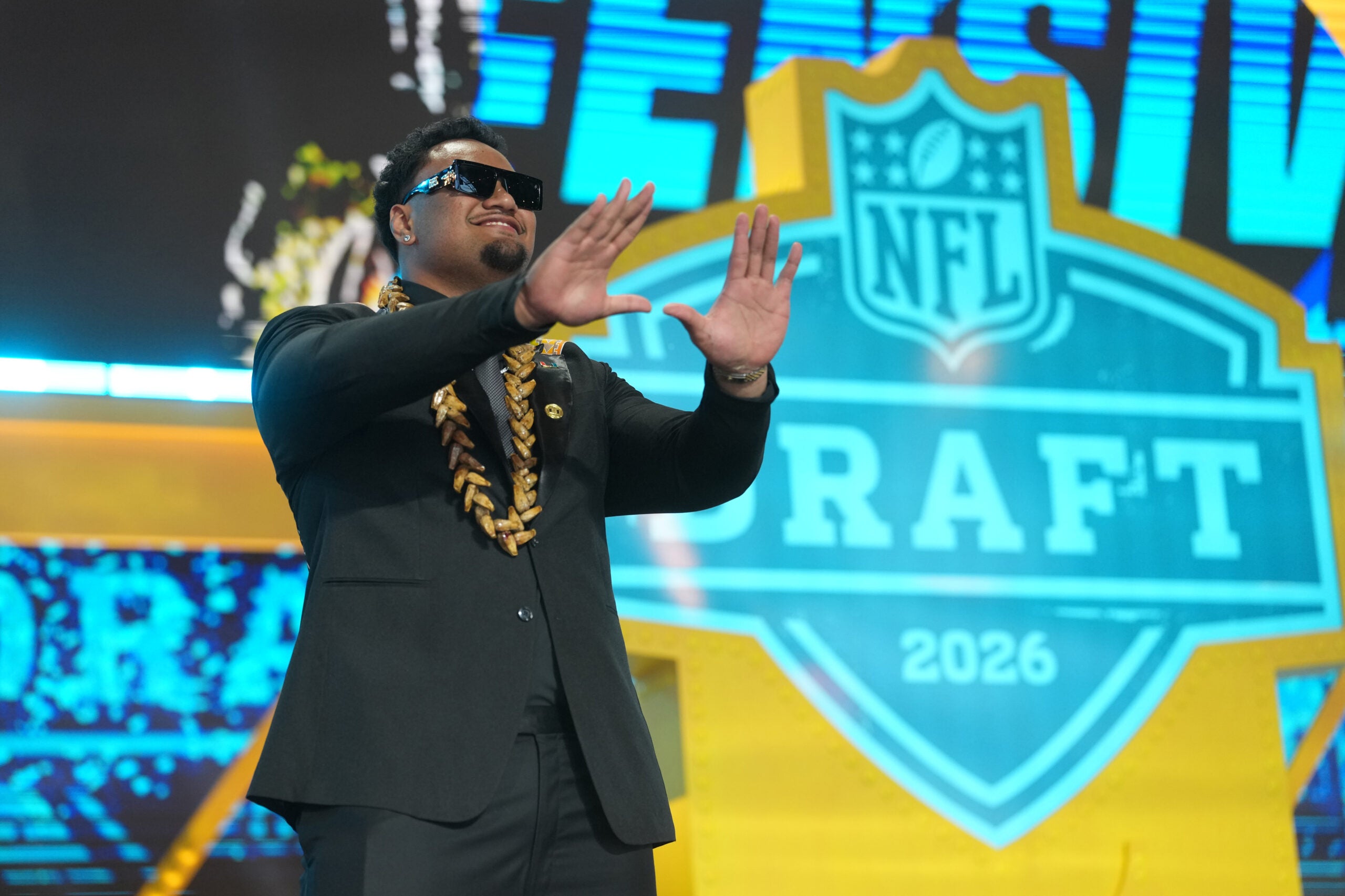 Apr 23, 2026; Pittsburgh, PA, USA; Miami Hurricanes lineman Francis Mauigoa is introduced before the 2026 NFL Draft at Acrisure Stadium.