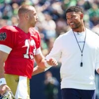 Notre Dame quarterback CJ Carr (13) and head coach Marcus Freeman during the Blue-Gold spring game at Notre Dame Stadium on Saturday, April 25, 2026, in South Bend.