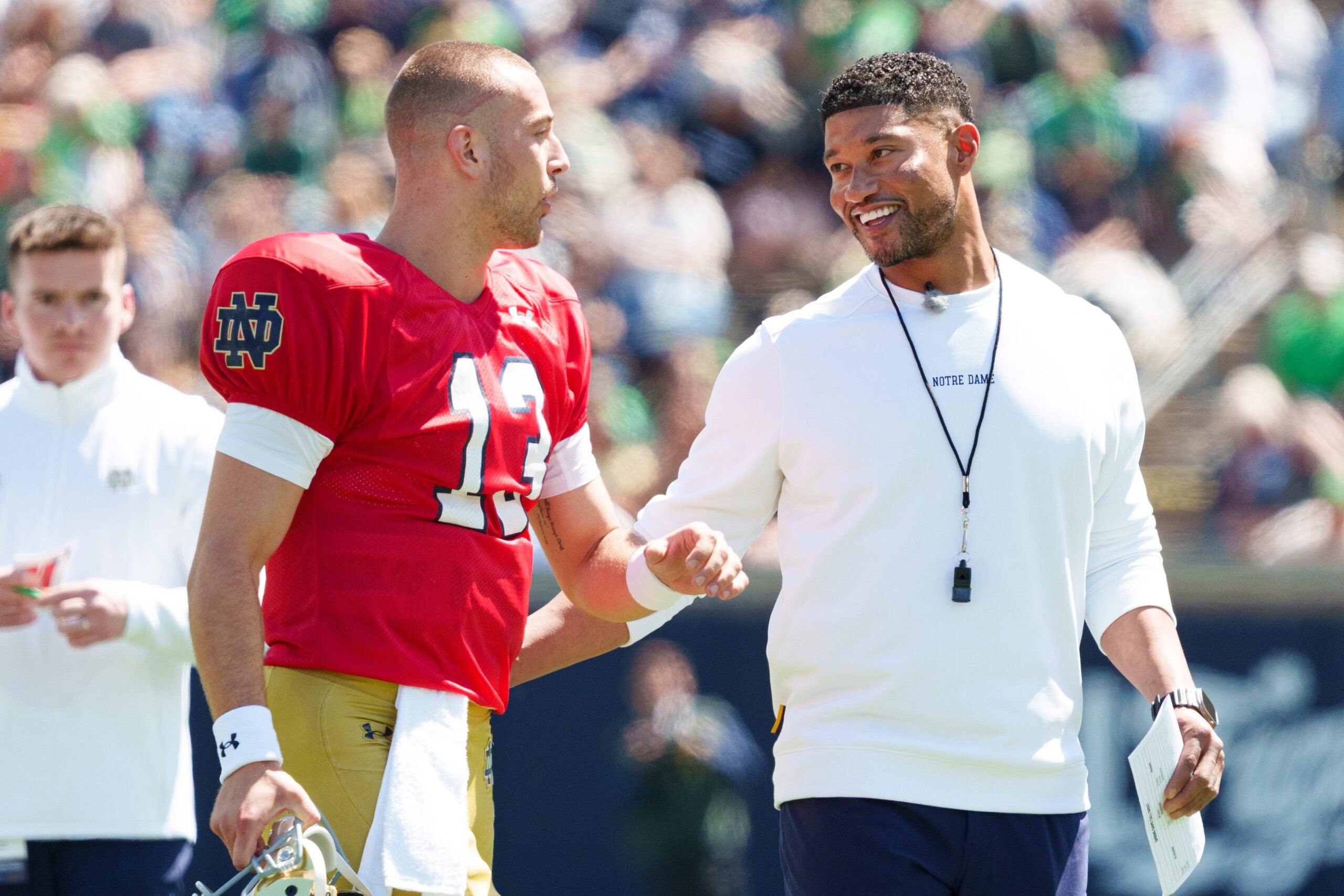 Notre Dame quarterback CJ Carr (13) and head coach Marcus Freeman during the Blue-Gold spring game at Notre Dame Stadium on Saturday, April 25, 2026, in South Bend.