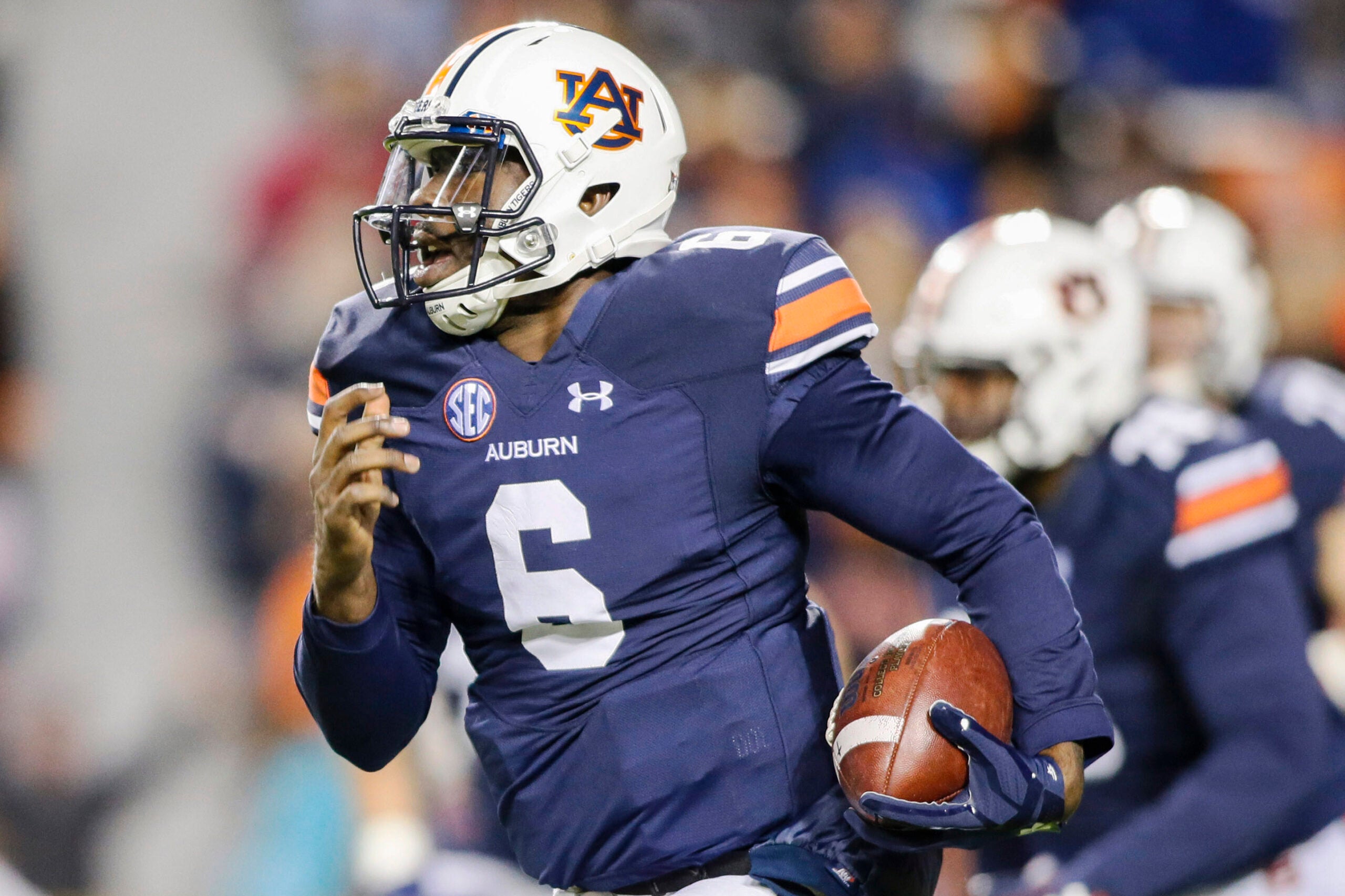 Nov 19, 2016; Auburn, AL, USA; Auburn Tigers quarterback Jeremy Johnson (6) carries against the Alabama A&M Bulldogs during the second quarter at Jordan Hare Stadium.