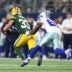 Jan 15, 2017; Arlington, TX, USA; Green Bay Packers strong safety Micah Hyde (33) runs the ball against Dallas Cowboys wide receiver Dez Bryant (88) after an interception during the third quarter in the NFC Divisional playoff game at AT&T Stadium.