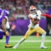 Oct 23, 2023; Minneapolis, Minnesota, USA; San Francisco 49ers wide receiver Jauan Jennings (15) runs after the catch against the Minnesota Vikings cornerback Akayleb Evans (21) in the first quarter at U.S. Bank Stadium.
