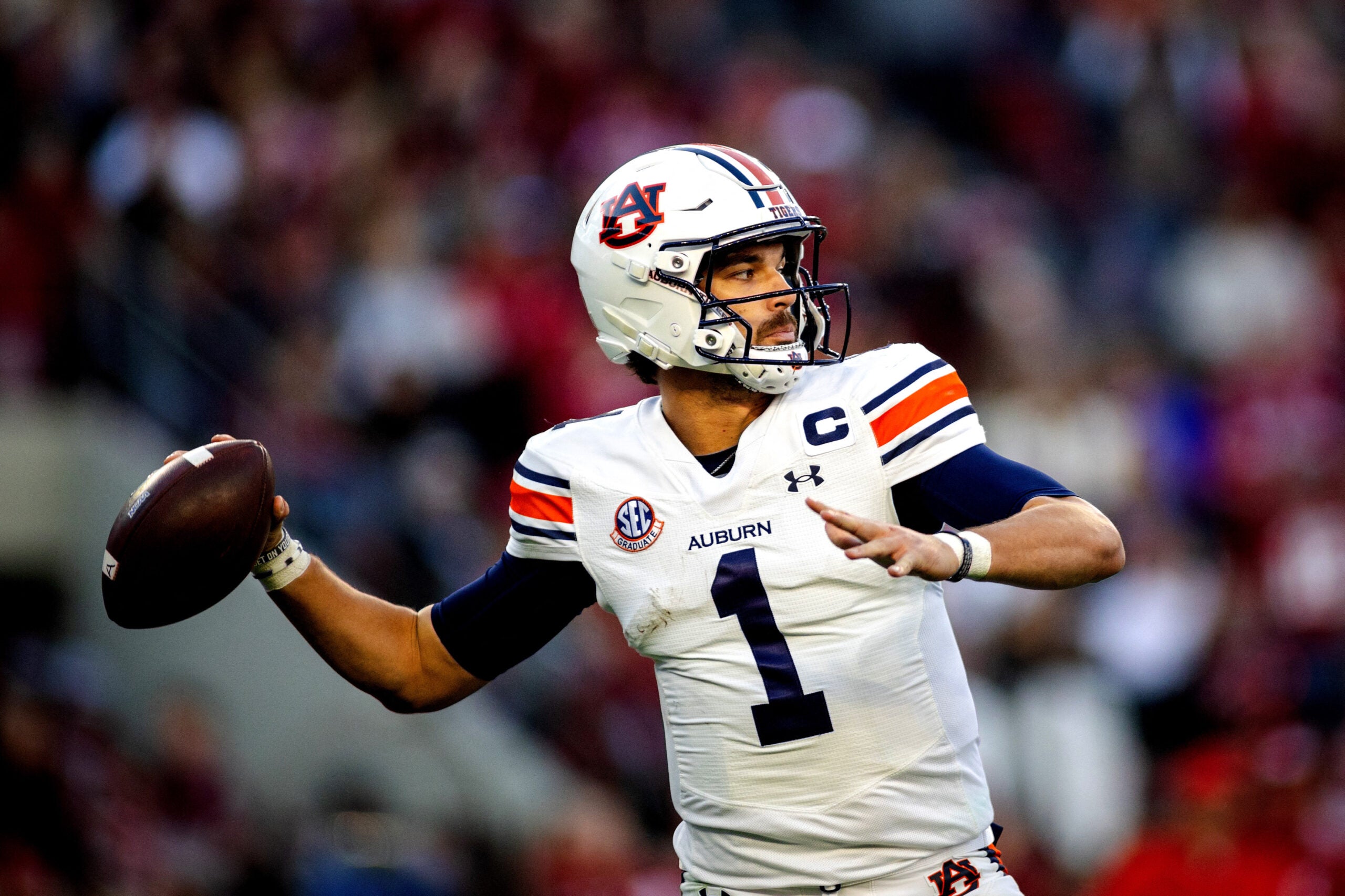 Nov 30, 2024; Tuscaloosa, Alabama, USA; Auburn Tigers quarterback Payton Thorne (1) throws against the Alabama Crimson Tide during the second quarter at Bryant-Denny Stadium.