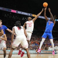 Apr 7, 2025; San Antonio, TX, USA; Florida Gators guard Denzel Aberdeen (11) shoots over Houston Cougars guard Terrance Arceneaux (23) in the first half in the national championship game of the Final Four of the 2025 NCAA Tournament at the Alamodome.