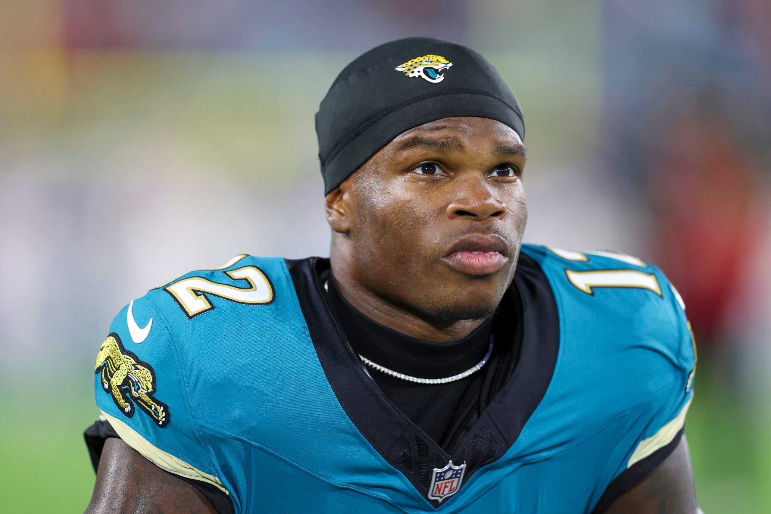 Oct 6, 2025; Jacksonville, Florida, USA; Jacksonville Jaguars wide receiver Travis Hunter (12) looks on before a game against the Kansas City Chiefs at EverBank Stadium.