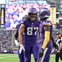 Nov 16, 2025; Minneapolis, Minnesota, USA; Minnesota Vikings wide receiver Jordan Addison (3) and tight end T.J. Hockenson (87) celebrate a touchdown during the fourth quarter against the Chicago Bears at U.S. Bank Stadium.