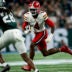 Nov 29, 2025; Detroit, Michigan, USA; Maryland wide receiver Shaleak Knotts (4) runs into Michigan State defensive back Dontavius Nash (28) in the second quarter at Ford Field.