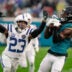 Dec 7, 2025; Jacksonville, Florida, USA;Jacksonville Jaguars wide receiver Brian Thomas Jr. (7) catches a pass over Indianapolis Colts cornerback Kenny Moore II (23) at EverBank Stadium.