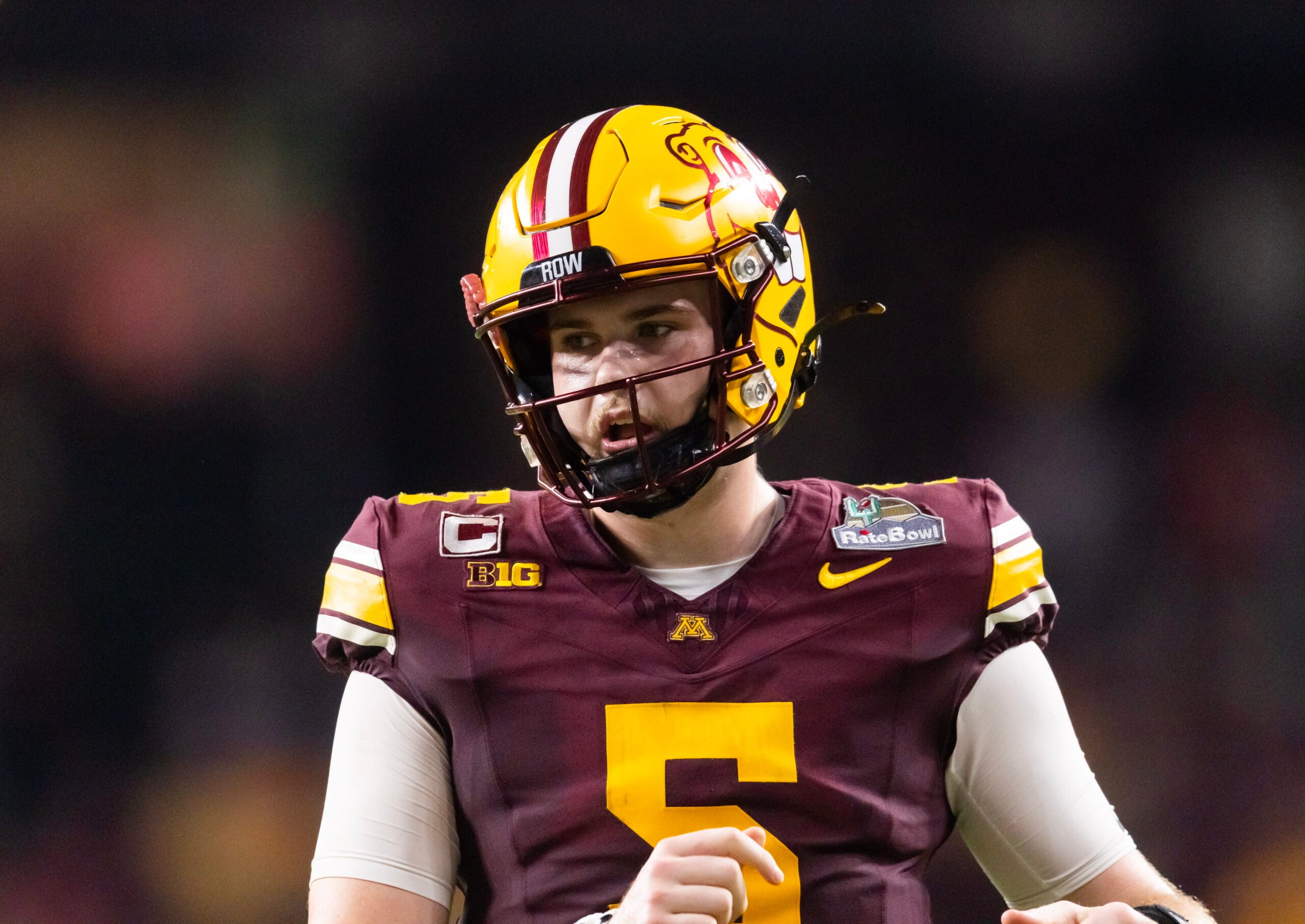 Dec 26, 2025; Phoenix, AZ, USA; Minnesota Golden Gophers quarterback Drake Lindsey (5) against the New Mexico Lobos during the Rate Bowl at Chase Field.