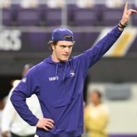 Jan 4, 2026; Minneapolis, Minnesota, USA; Minnesota Vikings quarterback J.J. McCarthy (9) warms up prior to the game against the Green Bay Packers at U.S. Bank Stadium.