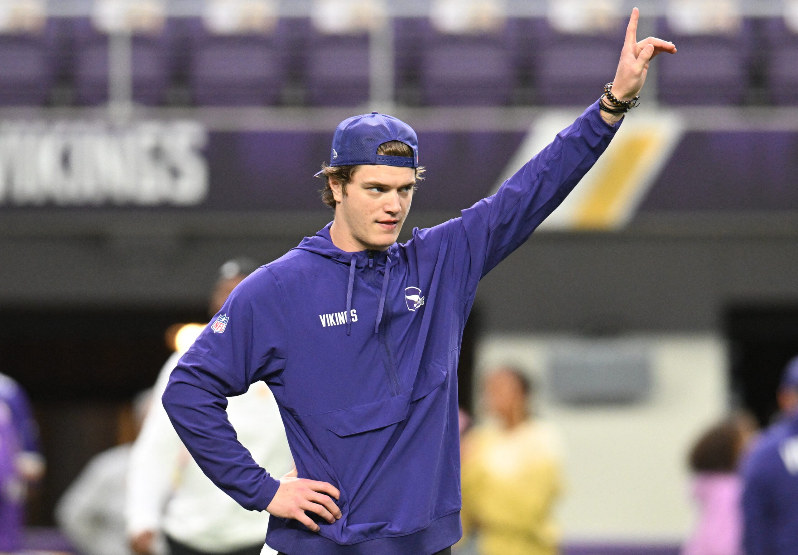 Jan 4, 2026; Minneapolis, Minnesota, USA; Minnesota Vikings quarterback J.J. McCarthy (9) warms up prior to the game against the Green Bay Packers at U.S. Bank Stadium.