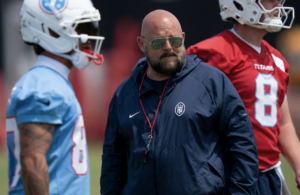 Tennessee Titans offensive coordinator Brian Daboll, Cam Ward, Carnell Tate