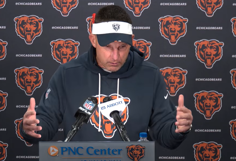 Chicago Bears defensive coordinator Dennis Allen speaks with reporters during rookie minicamp.