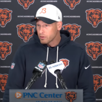 Chicago Bears head coach Ben Johnson talks with reporters during rookie minicamp.