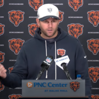 Chicago Bears offensive coordinator Press Taylor speaks with reporters during rookie minicamp.