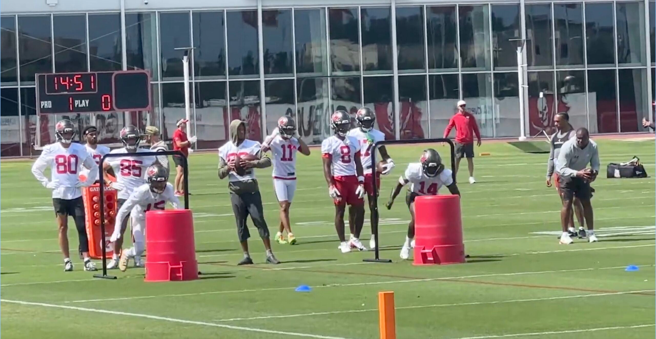 Buccaneers receivers Chris Godwin Jr. and Tez Johnson (15) participate in a drill during OTAs.