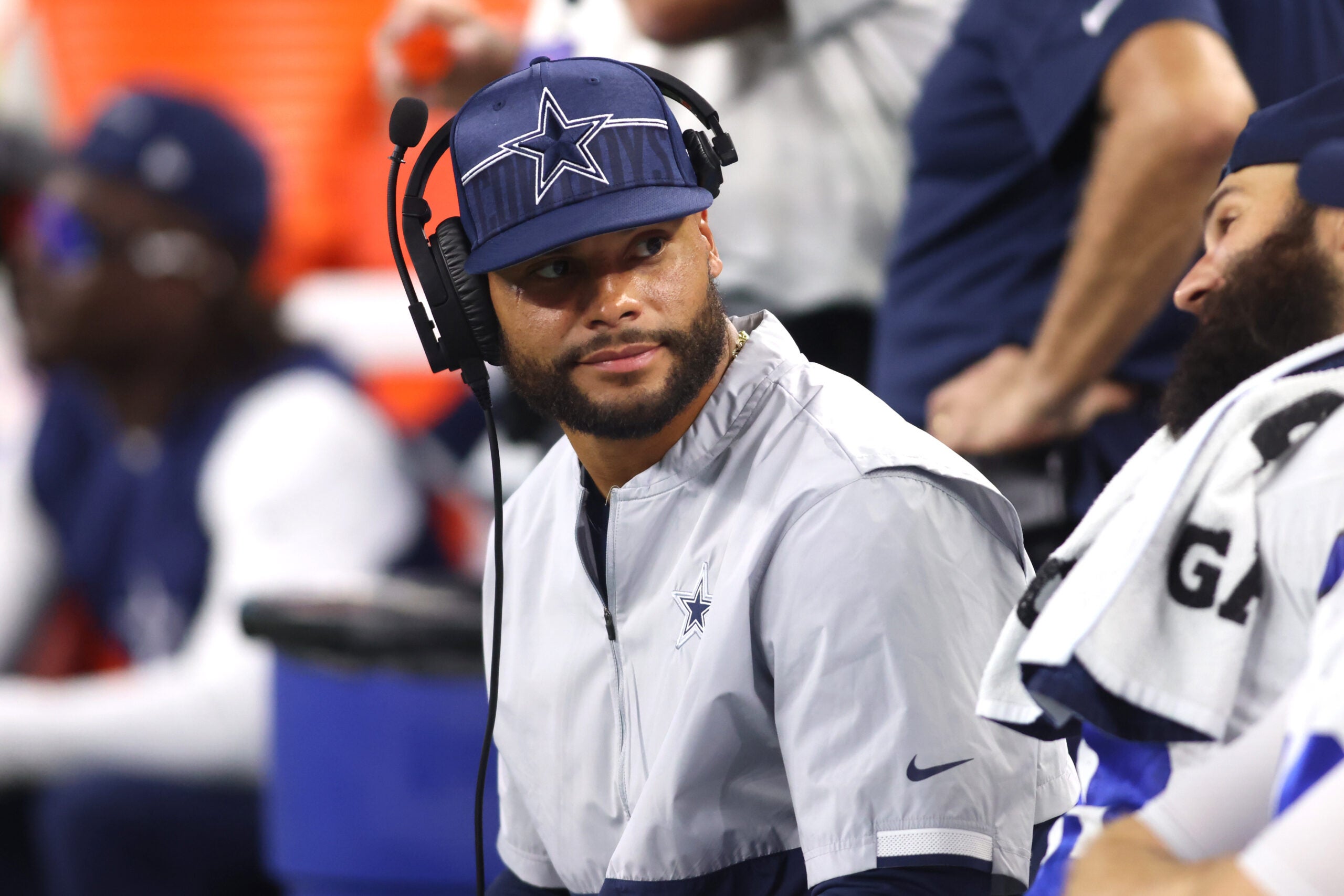 Aug 26, 2023; Arlington, Texas, USA; Dallas Cowboys quarterback Dak Prescott (4) sits on the bench during the game against the Las Vegas Raiders at AT&T Stadium.
