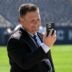 Green Bay Packers general manager Brian Gutekunst face times before the Green Bay Packers play the Chicago Bears on Sunday, Sept. 10, 2023 at Soldier Field in Chicago.