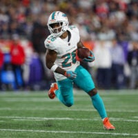 Sep 17, 2023; Foxborough, Massachusetts, USA; Miami Dolphins running back Salvon Ahmed (26) runs the ball during the first half against the New England Patriots at Gillette Stadium.