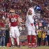 Sep 21, 2023; Santa Clara, California, USA; San Francisco 49ers tight end George Kittle (85) points his finger next to New York Giants linebacker Kayvon Thibodeaux (5) after the Giants were called for a penalty in the third quarter at Levi's Stadium.