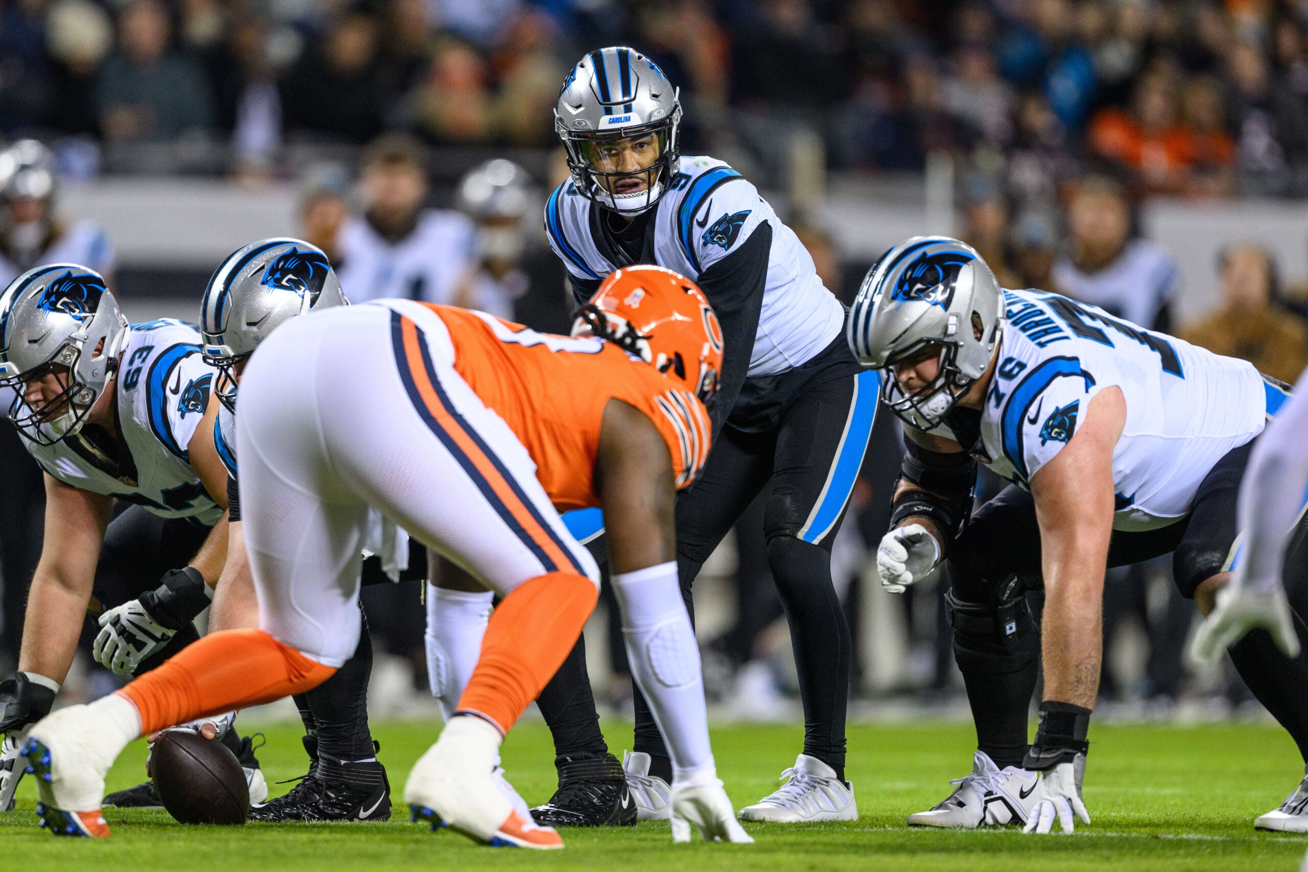 Nov 9, 2023; Chicago, Illinois, USA; Carolina Panthers quarterback Bryce Young (9) stands over center against the Chicago Bears during the second quarter at Soldier Field.