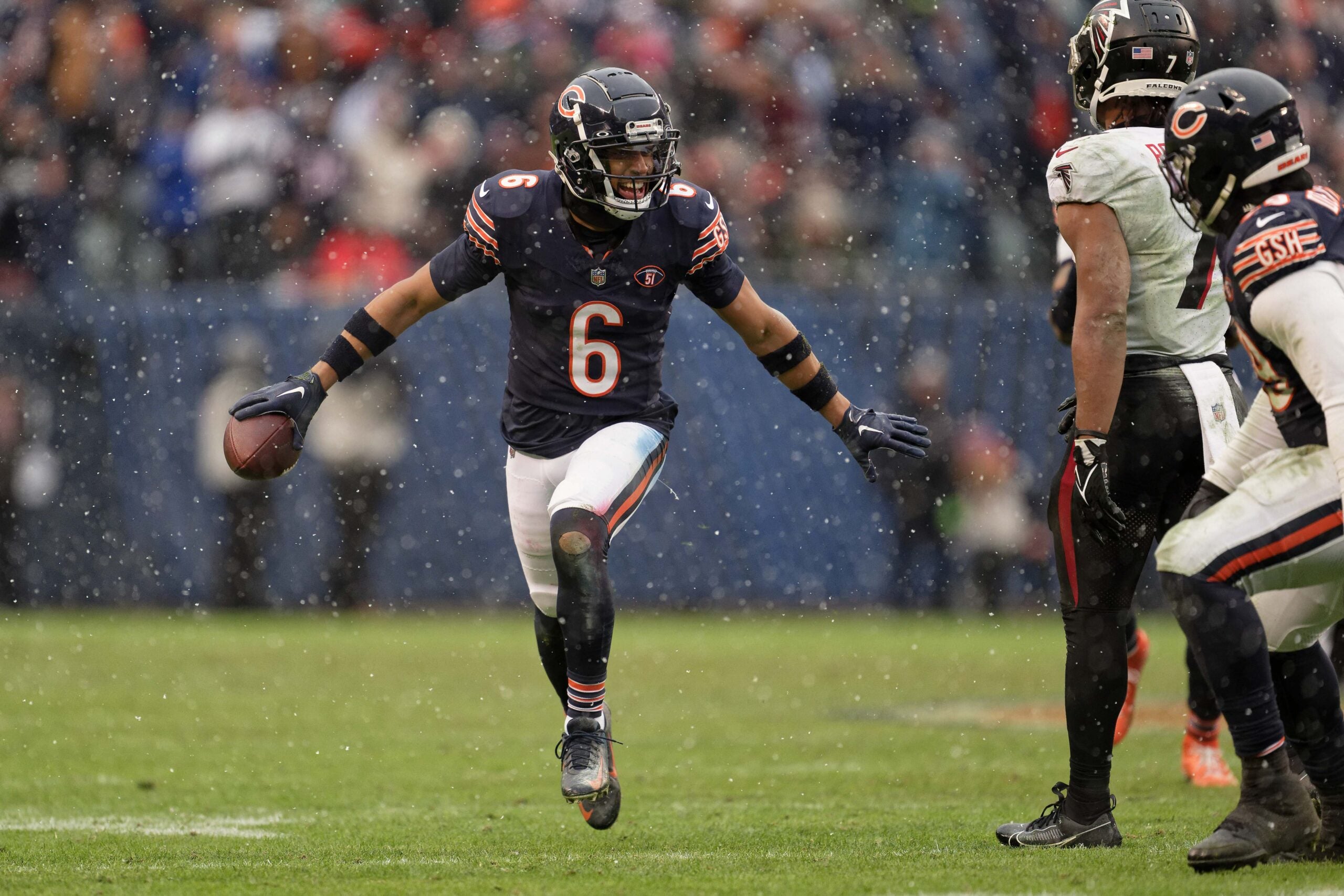 Dec 31, 2023; Chicago, Illinois, USA; Chicago Bears defensive back Kyler Gordon (6) celebrates after making an interception against the Atlanta Falcons at Soldier Field.