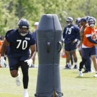 May 31, 2024; Lake Forest, IL, USA; Chicago Bears offensive tackle Braxton Jones (70) runs during organized team activities at Halas Hall.